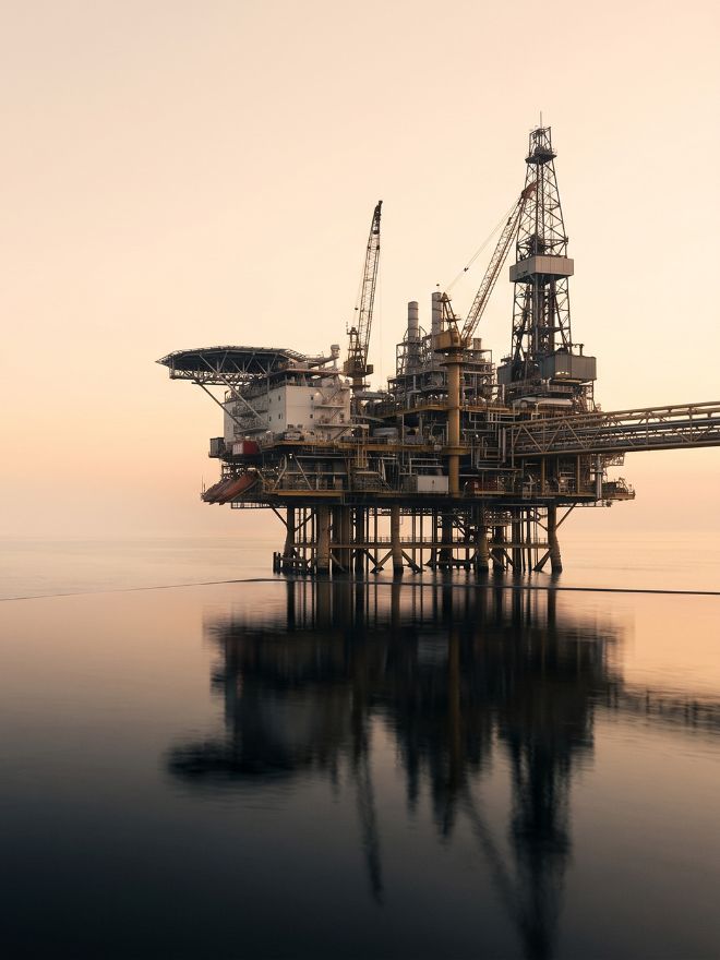 Offshore drilling platform at dusk